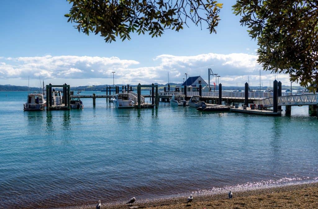 The seaside passenger ferry jetty at the waterfront of Russell township, New Zealand’s first permanent European settlement and historic capital.